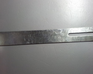 Adjustable support for control pan dish